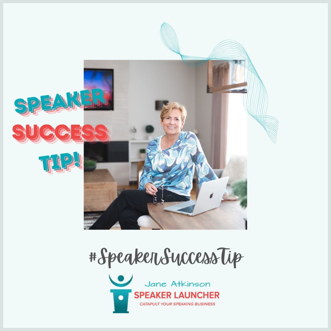 image of Jane Atkinson sitting at a table with a laptop holding a pair of glasses and text that says: Speaker Success Tip
